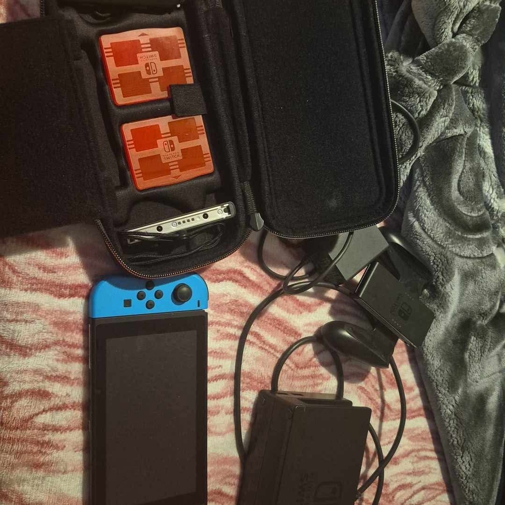 Nintendo Switch Console with Blue and Red Accents
